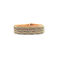 Handgjort armband Vájma i läder och tenntråd, inspirerat av samisk tradition och naturen i Lappland.